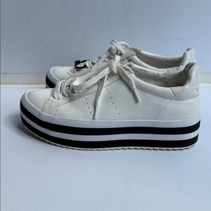 Stylish White Platform Sneakers with Black Stripes